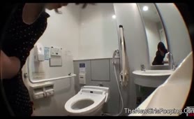 Japanese girl using a public bathroom