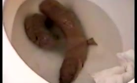 Black girl with curly hair pooping