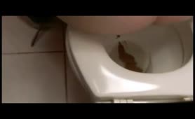 She's shaking her ass and she's pooping