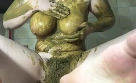 Busty wife masturbates in green shit
