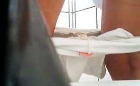 Spying on hairy babe shitting