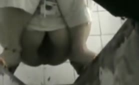 Hairy babe caught shitting in public