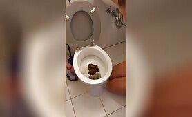 Nude Woman Eats a Thick Dump from the Toilet Bowl