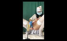 Nurse Shits and Pisses While Squirting in Blue Gloves